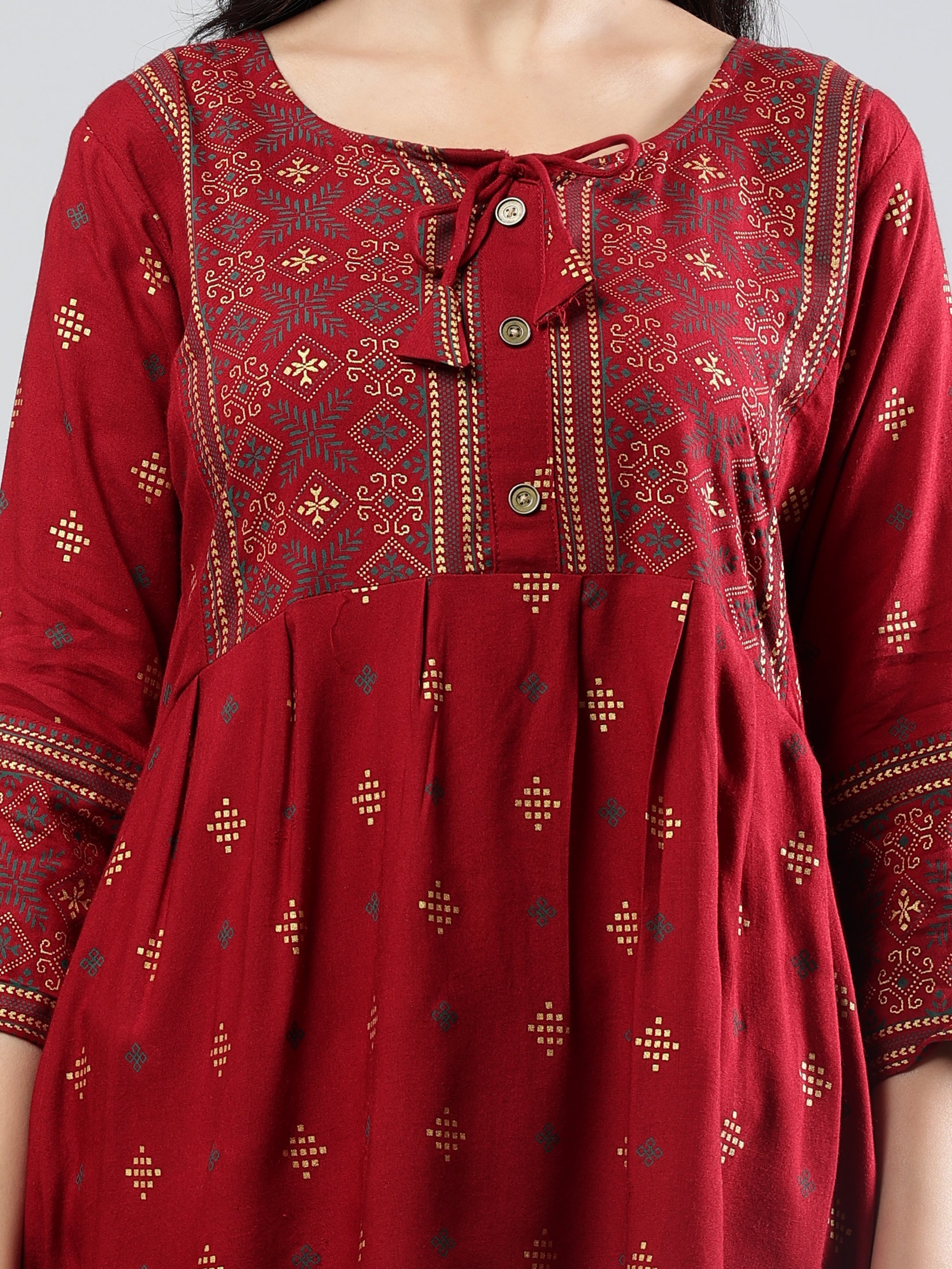 Floral Printed Maroon Round Neck Three Quarter Sleeves Top