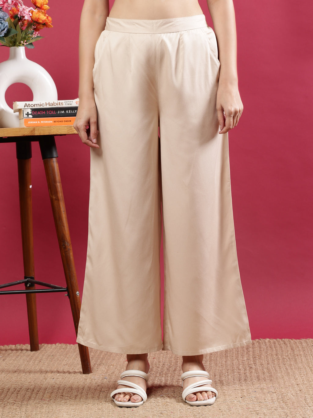 Cream Flared Solid Palazzo Pants with Side Pockets