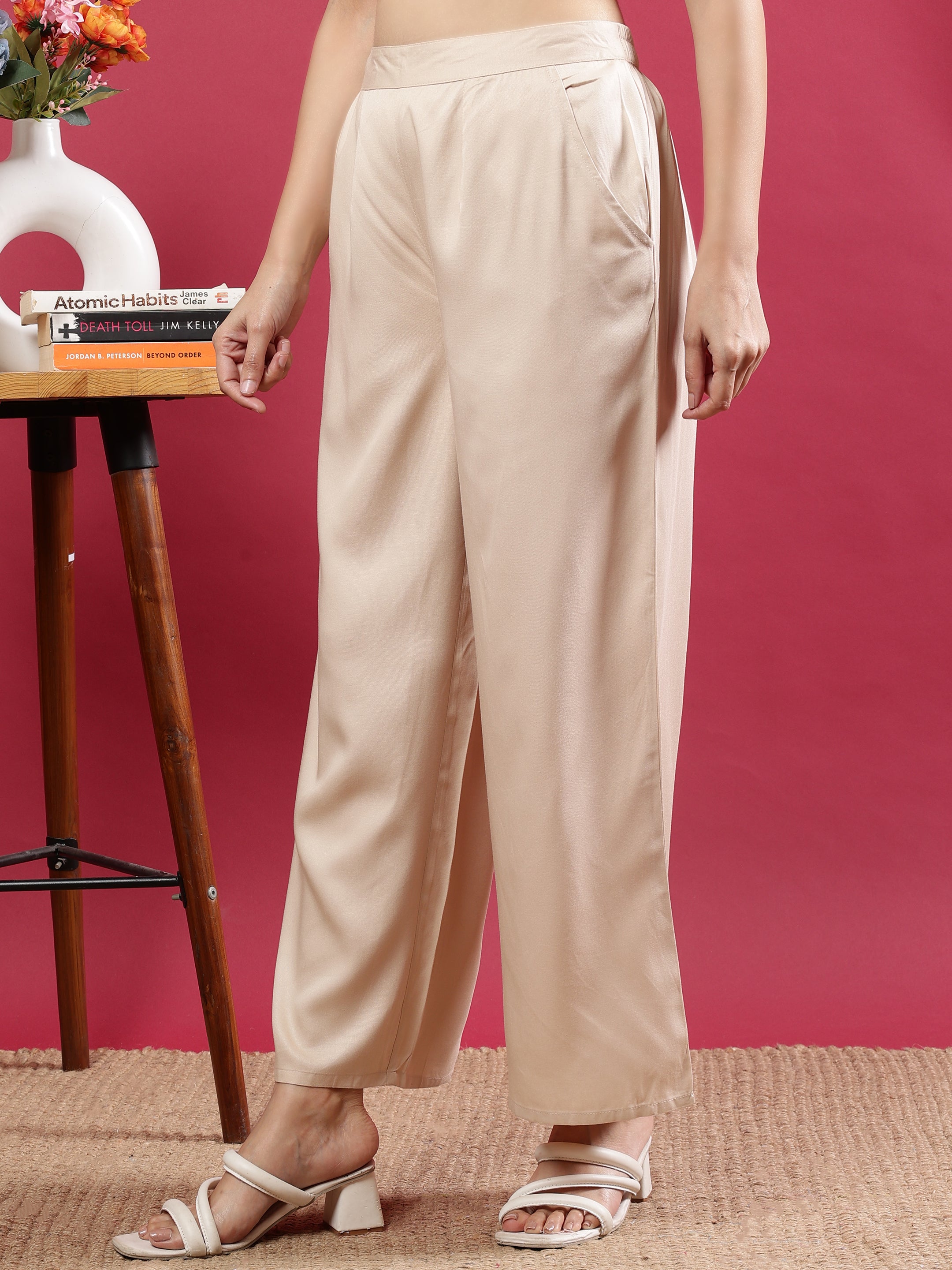 Cream Flared Solid Palazzo Pants with Side Pockets