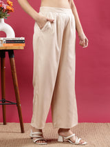 Cream Flared Solid Palazzo Pants with Side Pockets Cream Rayon